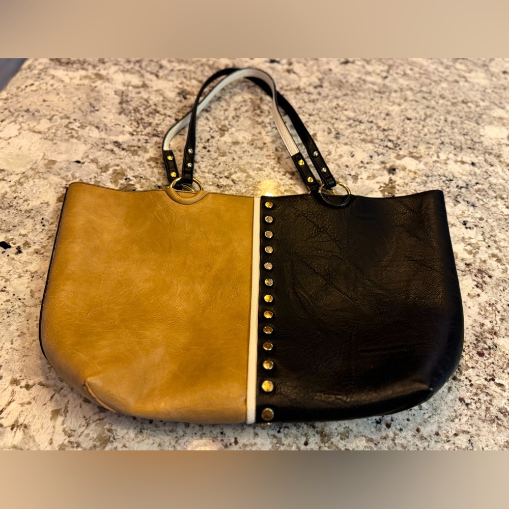 Striking Black and Tan Shoulder Bag with Metallic Studs